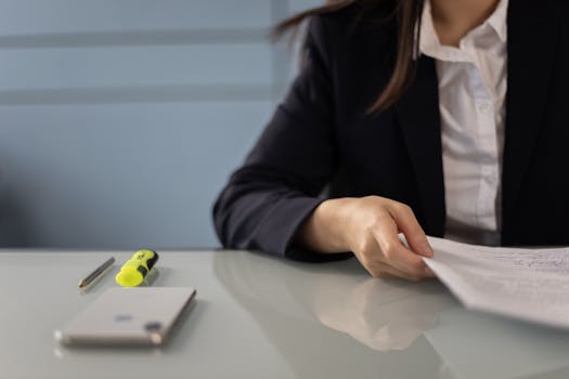 Image of a person reviewing finance documents