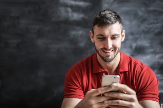 man using budgeting app on smartphone