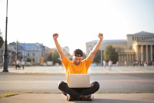 Freelancer celebrating success while traveling