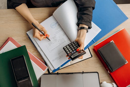 a person reviewing their financial plan on a laptop