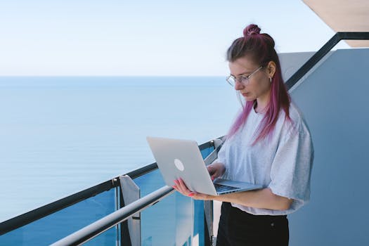 digital nomad working on a beach