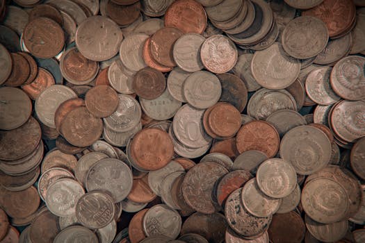 stacks of coins with international flags