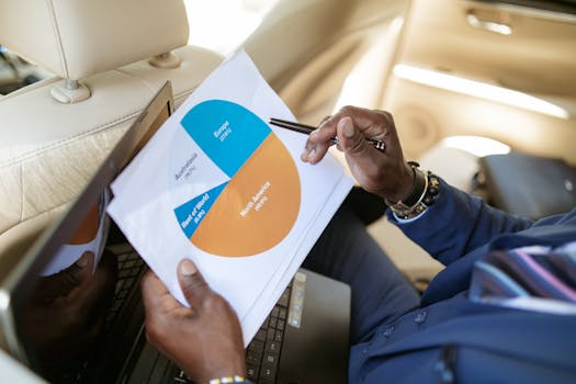 person reviewing tax documents while traveling