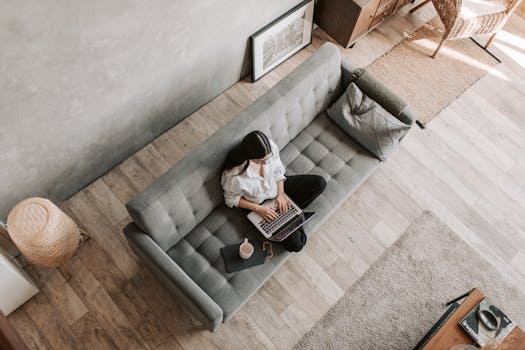 cozy workspace with a laptop and a view