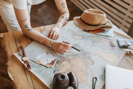 a traveler planning finances on a laptop