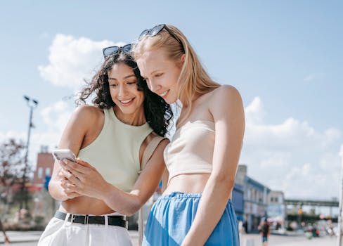 A digital nomad checking alerts on their smartphone